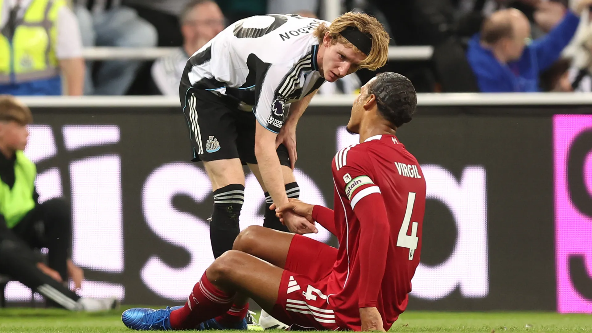 Anthony Gordon speaks to Van Dijk after injuring him in Liverpool vs New Castle